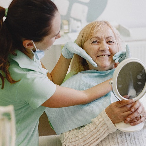 New Baltimore patient considering All-on-4 implants 