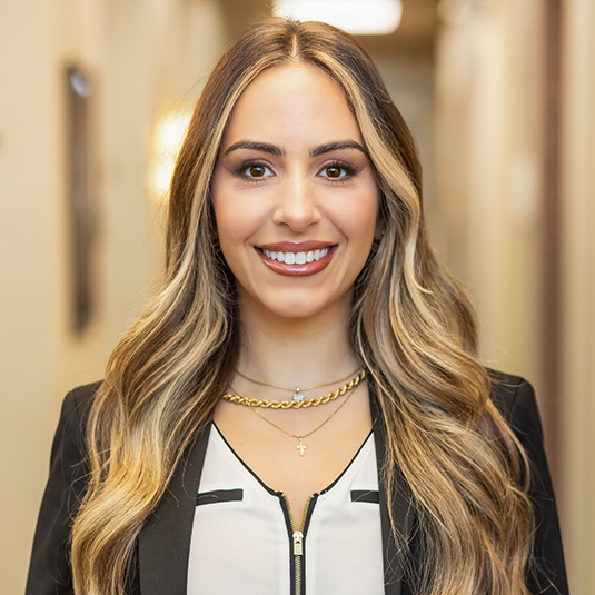 New Baltimore dentist Doctor Nicole DeBellis smiling