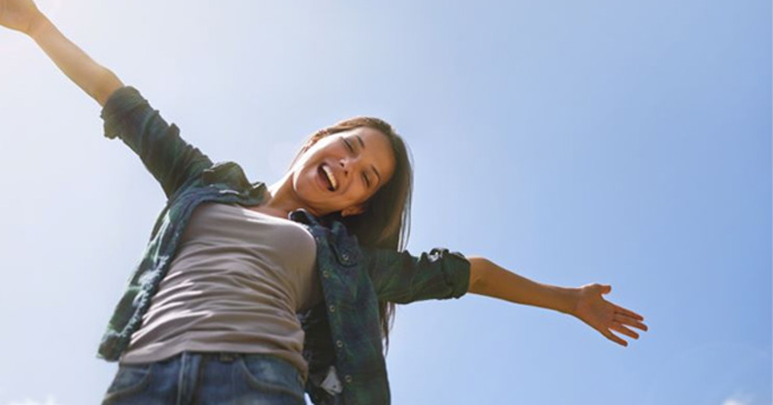 Happy woman enjoying time outdoors