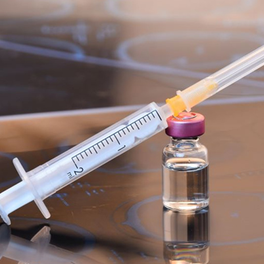 Vial of BOTOX with small syringe