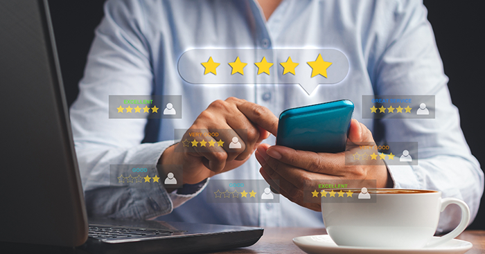 Person looking at several reviews on their phone
