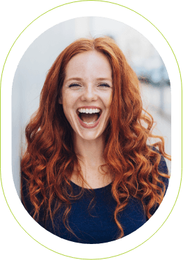 woman with red hair smiling