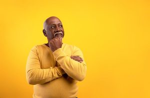 Senior man wearing contemplative expression